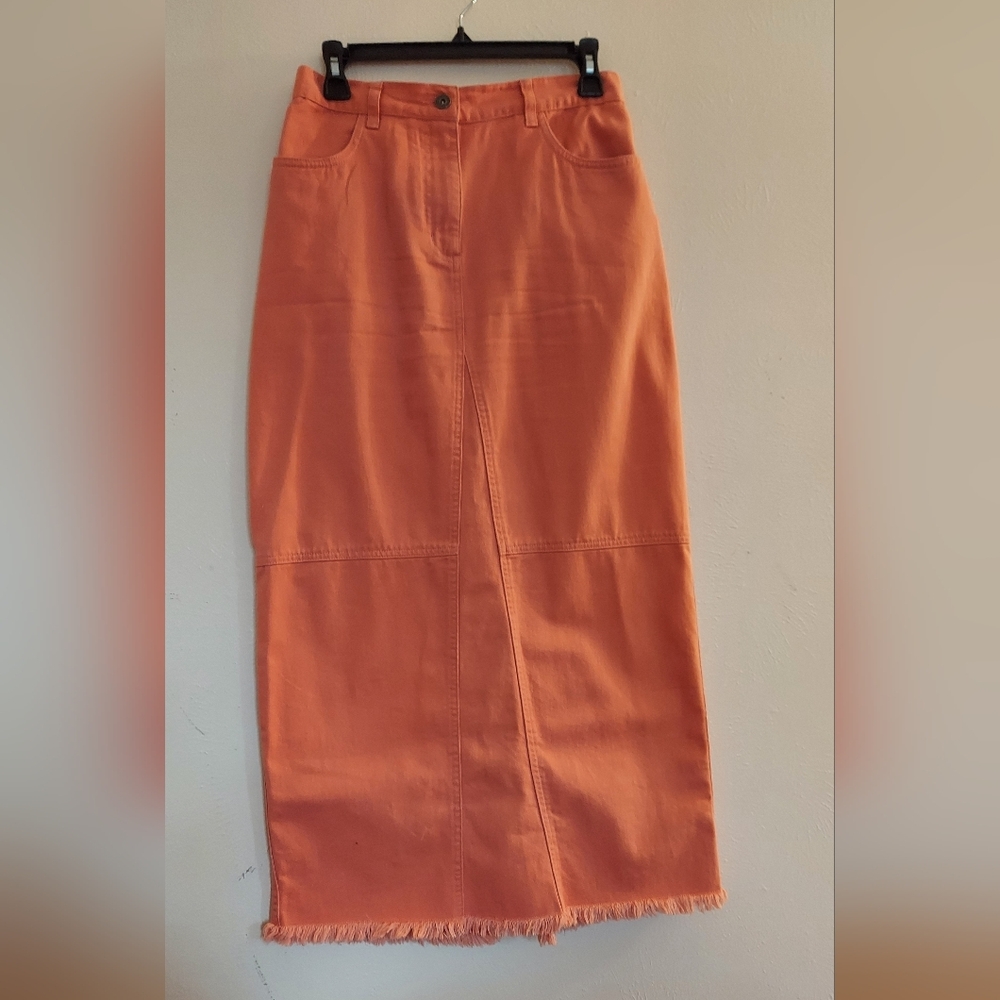 Long denim jean skirt with fringed hem